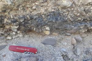 Black gravel layer from Colorado River alluvium near Bullhead City.